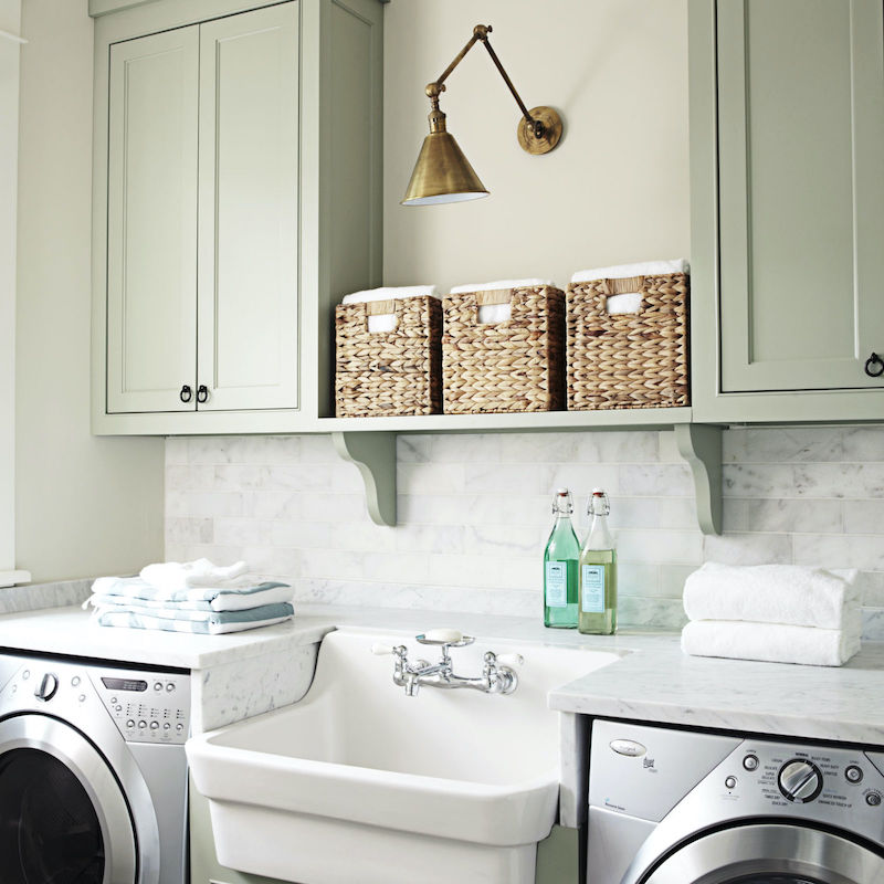 Green laundry room cabinets